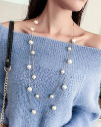 64+ cm Austrian-crystal & pearl double-layer sweater-chain necklace, gold-tone links—adds refined sparkle to winter knits or summer tees.