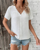 Elevate your everyday wardrobe with our lightweight lace-trimmed V-neck blouse. Featuring delicate texture and a relaxed fit, it blends comfort with timeless elegance. Shop Gentle Herd’s minimalist women’s tops now.