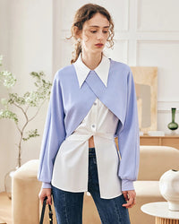 Women's fashion-forward layered shirt featuring light blue knit overlay with white button-down base, pointed collar and asymmetric hem design for contemporary street style.