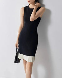 Women’s viscose sleeveless dress with ruffled hem and O-neck—playful summer piece for weekend brunches, rooftop cocktails or garden parties.